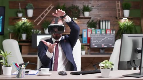 Man Using VR Headset in Modern Office
