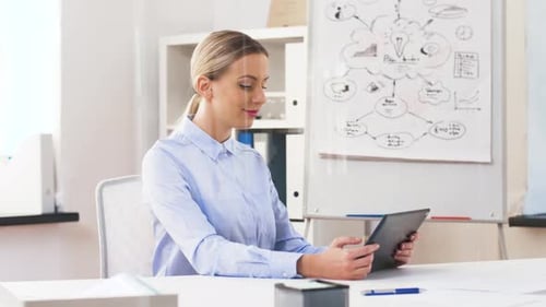 Business Woman on Video Call in Office