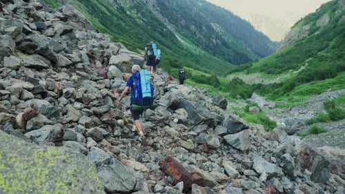 Few Friends Walking Along Hiking Trail Path