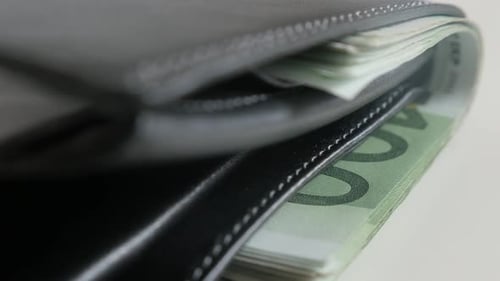 Wallet Stuffed with One Hundred Euro Banknotes