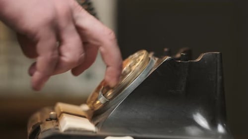 Old Soviet State Telephone Man Presses Button and Picks Up the Receiver