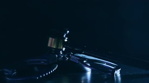 Gavel and Handcuffs with Pulsing Light