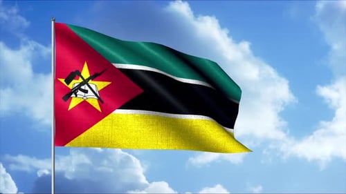 Mozambique National Flag Waving in a Clear Blue Sky