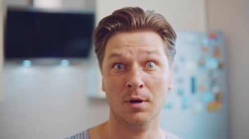 Man's Face Expressing Extreme Happiness and Surprise