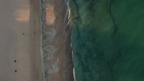 Top view of empty endless wild beach