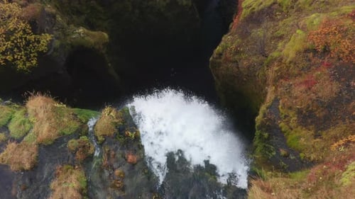 Drone Shot Of Falling Water Cascading Down