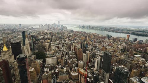 Clouds Quickly Fly Over Manhattan, Beautifully Illuminating the Skyscrapers of Downtown New York