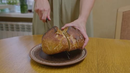 Commercial Shots a Girl Baked Bread She Cuts It with a Knife Breaks It with Her Hands Sniffs It It