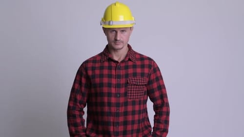 Handsome Bearded Man Construction Worker Against White Background