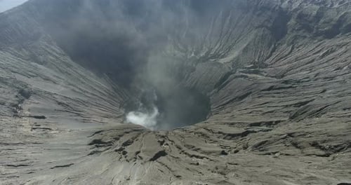 Aerial. Picturesque Landscape. Bali Island, Indonesia. Active Volcano Crater, White Smoke Inside