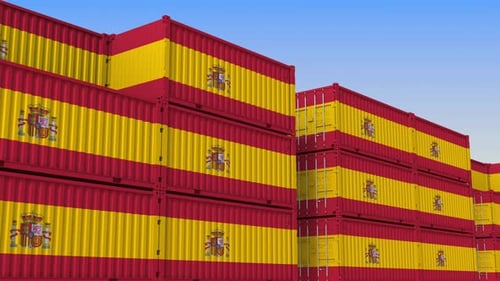 Container Yard Full of Containers with Flag of Spain