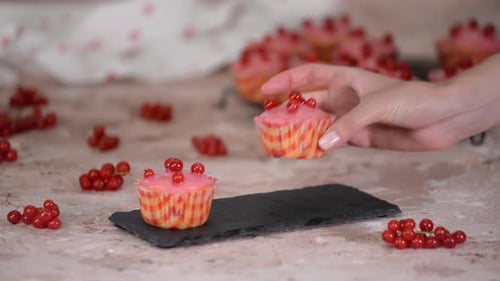 Muffins with Pink Frosting and Red Currants