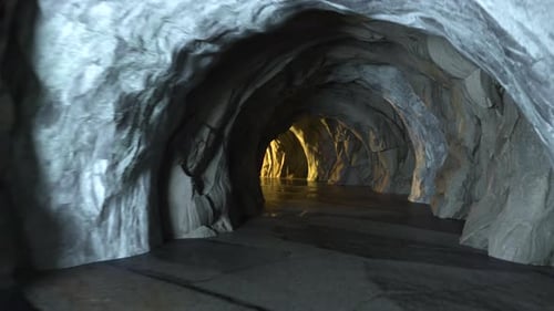 Animation of going forward in the dark rock tunnel.