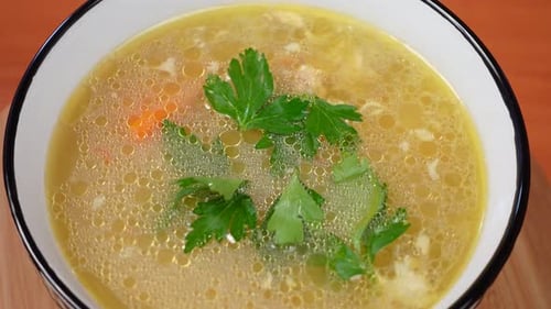 Bowl of Delicious Homemade Vegetable Soup with Parsley