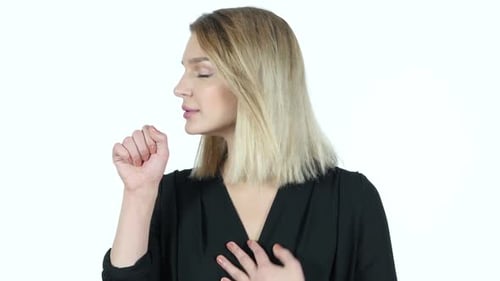 Young Woman Coughing into Hand on White Background