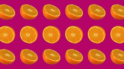 Vibrant Halved Oranges Animated Pattern Background