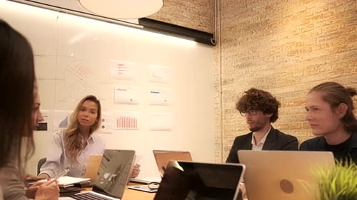 Meeting of multiracial professional teamwork with coworkers at the business office.