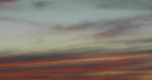 Colorful Gradient Sky with Wispy Clouds at Sunset