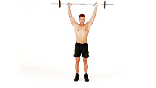Muscular Man Lifting Weights