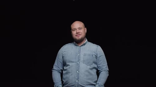 Adult Man Smiling and Looking at the Camera