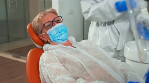 Portrait on Patient with Teeth Ache During Coronavirus at Clinic