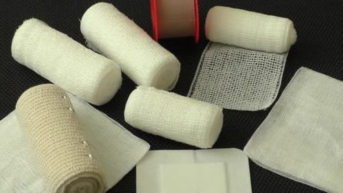 Close Up of Medical Bandages and Gauze Pads