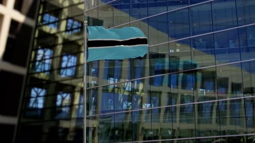 Botswana Flag Waving On A Skyscraper Building