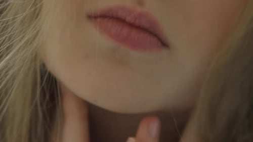 Woman's Lips and Chin in Extreme Close Up