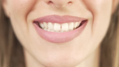 Close Up of Smiling Teeth Isolated