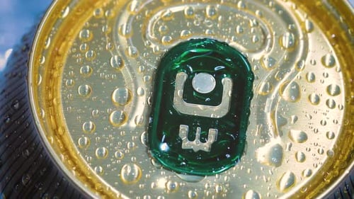 Close Up of Refreshing Beverage Can with Water Droplets