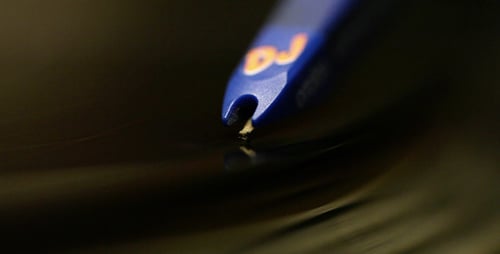 Record Player Stylus Close Up on Spinning Vinyl