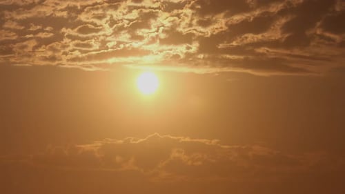 Golden Sun Breaks Through the Clouds