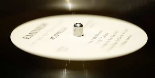 Vinyl Record Spinning on Turntable Close Up