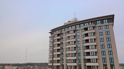 Modern Apartment Building Towering over City Skyline