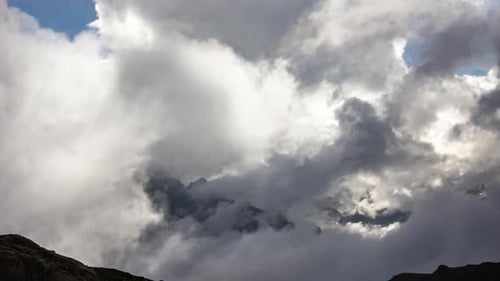 Clouds Moving over Mountainous Landscape