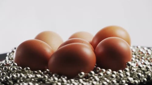 Close Up of Easter Eggs and Silver Beads