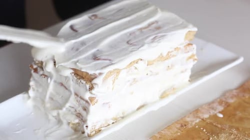 Icing a Multi-Layered Dessert Cake
