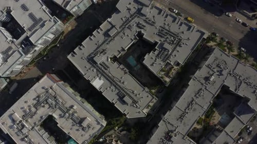 AERIAL: Birds Eye View Over Streets of Downtown Los Angeles, California with cars,Traffic and