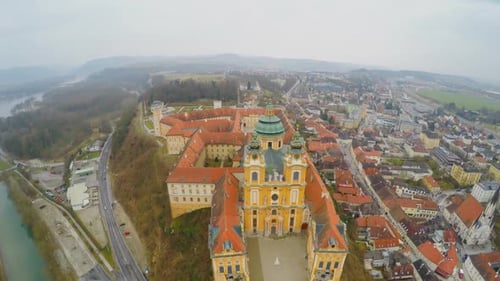 Aerial Shot of Beautiful Melk Abbey in Austria. River Danube. Cold Rainy Weather