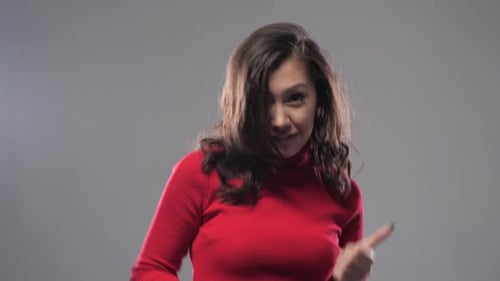 Smiling Woman Giving Thumbs Up Approval Gesture