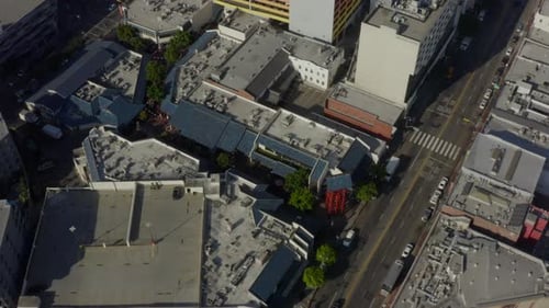 AERIAL: Birds Eye View of Downtown Los Angeles the Tilt Up To Skyline in Beautiful Daylight,
