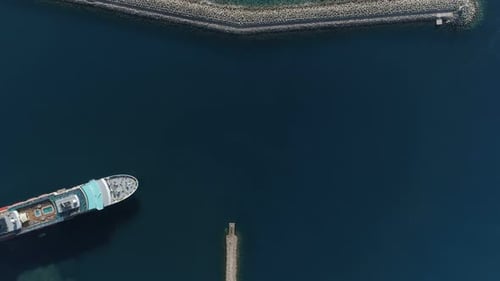 Aerial View of Luxury Medium Cruise Ship Sailing From Port