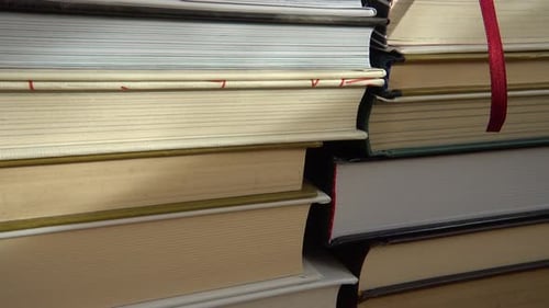 Stack of Books With Colorful Bookmarks