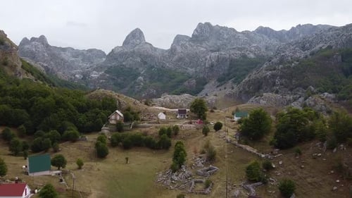 Bird's Eye View of Small Mountain Village on Valley