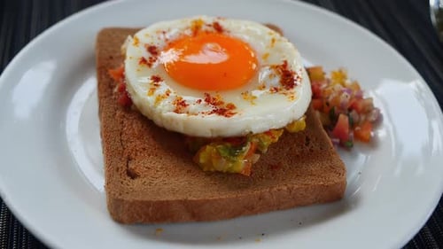 Delicious Fried Egg Sandwich with Salsa on Toast
