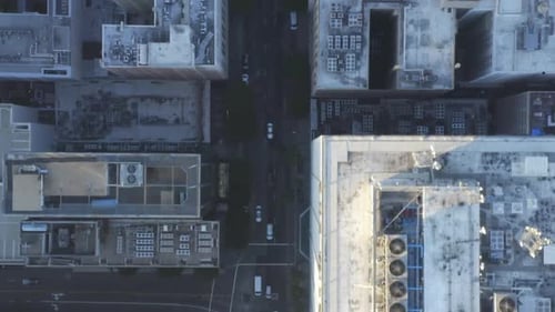 AERIAL: Slow Birds Eye View Flight Over Downtown Los Angeles California in Beautiful Sunrise Light