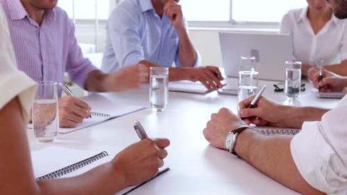 Business Professionals Collaborating Around a Table