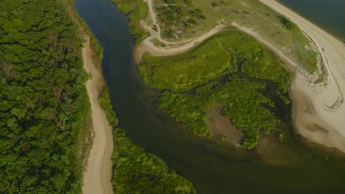 Top Down Aerial Pan of Inlet on Smithtown Bay Near Dense Forest Trees