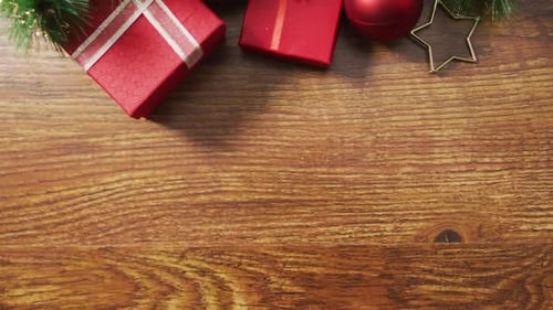 Christmas Gifts and Decorations on Wooden Table