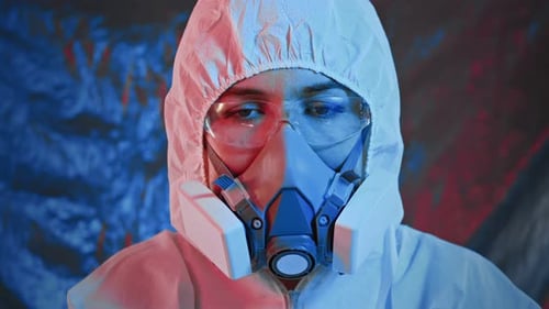 Hooded Person with Protective Mask, Glasses and Suit